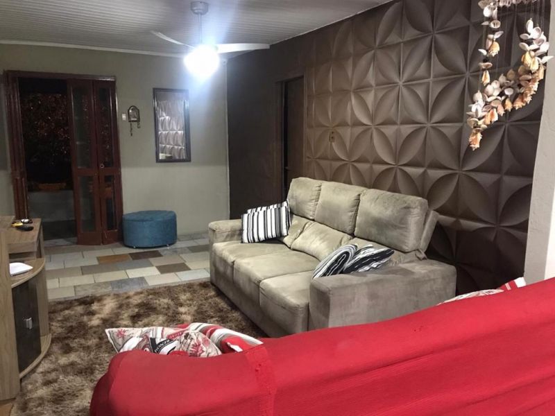 Casa 3 dormitórios no bairro Araçá