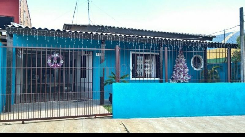 Casa 3 dormitórios no bairro Guajuviras em Canoas
