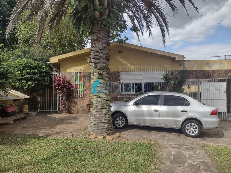 Casa 4 dormitórios no bairro Olaria em Canoas
