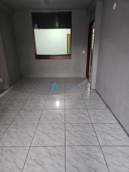 Sobrado 4 dormitórios no bairro Protásio Alves
