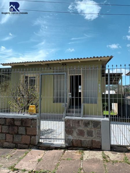 Casa 4 dormitórios no bairro Partenon em Porto Alegre - Paulo Rogério Garcia Imóveis - Bairro Partenon | Porto Alegre - RS 